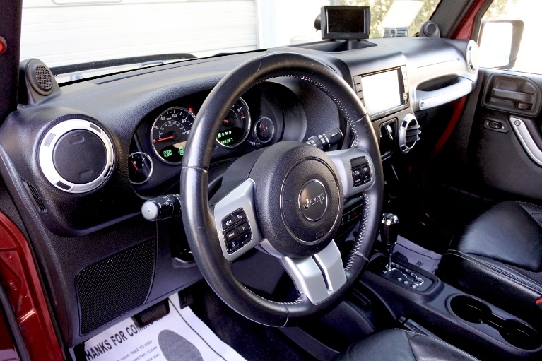 Used 2013 Jeep Wrangler Unlimited Freedom Edition 4WD Used 2013 Jeep Wrangler Unlimited Freedom Edition 4WD for sale at Metro West Motorcars LLC in Shrewsbury MA 13
