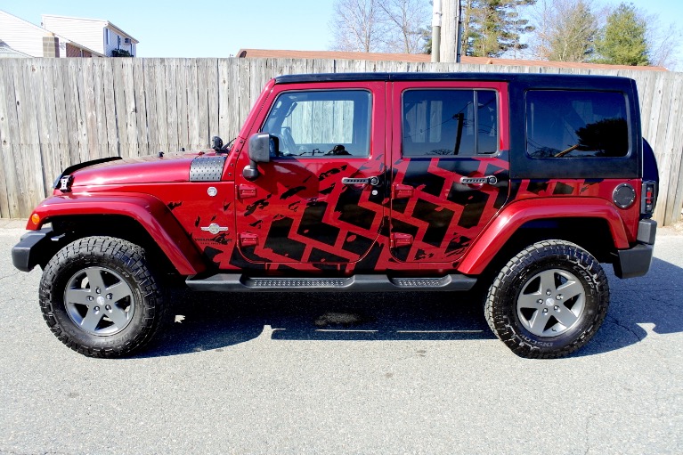 Used 2013 Jeep Wrangler Unlimited Freedom Edition 4WD Used 2013 Jeep Wrangler Unlimited Freedom Edition 4WD for sale at Metro West Motorcars LLC in Shrewsbury MA 2