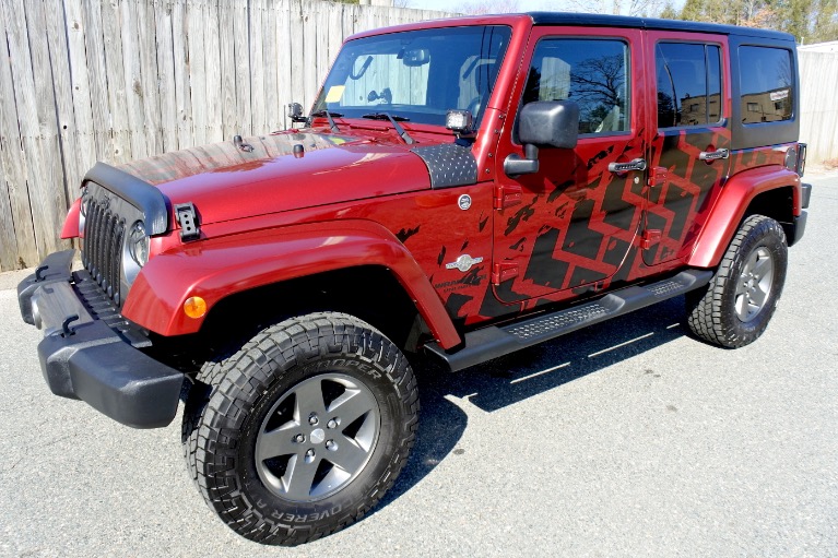 Used 2013 Jeep Wrangler Unlimited Freedom Edition 4WD Used 2013 Jeep Wrangler Unlimited Freedom Edition 4WD for sale at Metro West Motorcars LLC in Shrewsbury MA 1