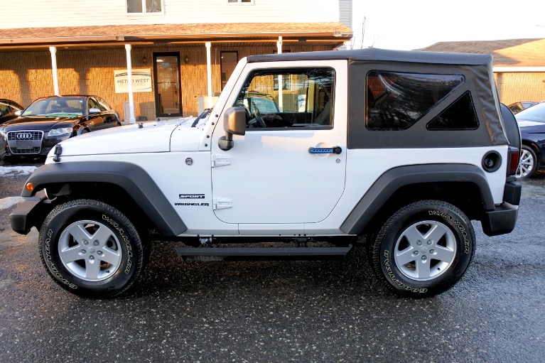 Used 2015 Jeep Wrangler 4WD 2dr Used 2015 Jeep Wrangler 4WD 2dr for sale at Metro West Motorcars LLC in Shrewsbury MA 2