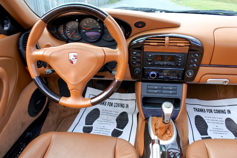 Used 2002 Porsche 911 Carrera C4 Cabriolet 6-Spd Man Used 2002 Porsche 911 Carrera C4 Cabriolet 6-Spd Man for sale at Metro West Motorcars LLC in Shrewsbury MA 18